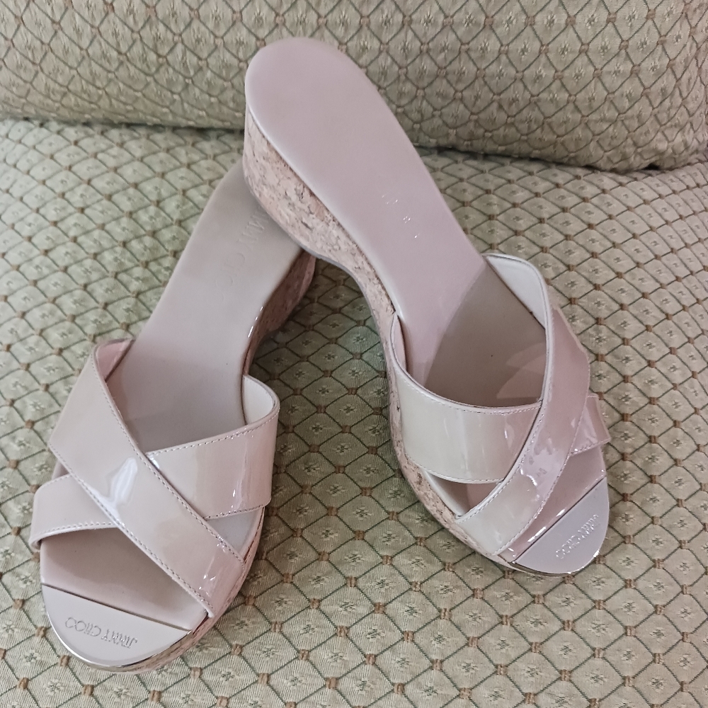 Jimmy Choo women's creme lather platform Mules.